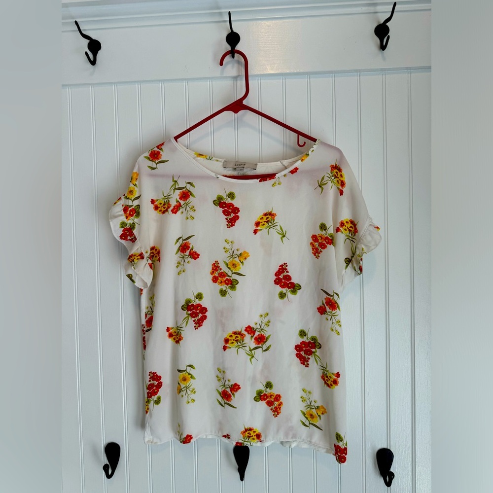 Women's Loft size small blouse. White. Made of 100% rayon.